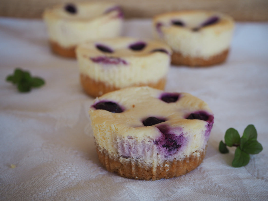 Baked berry cheesecakes